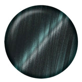 IBD Xenon Magnetic Gel swatch with deep charcoal base and vivid teal shimmer streaks in magnetic lines.